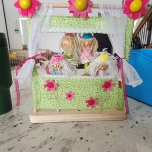 Colorful Puppet Theater with Dolls